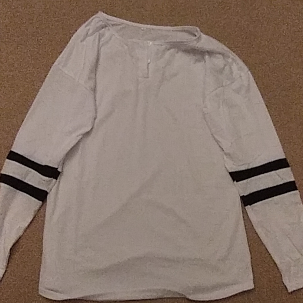 White long sleeve with blk stipes on sleeve